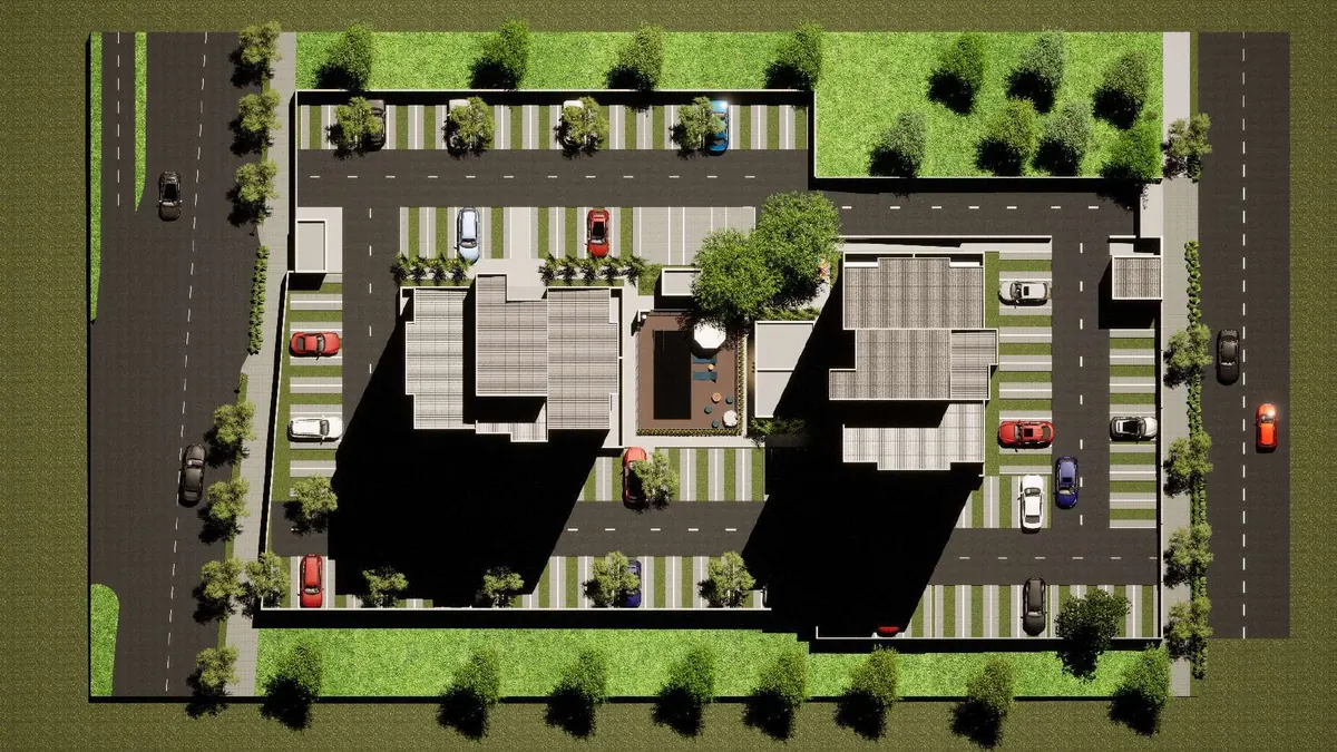 Implantação do Loft Pequis vista de cima: duas torres, estacionamento e área de convivência central