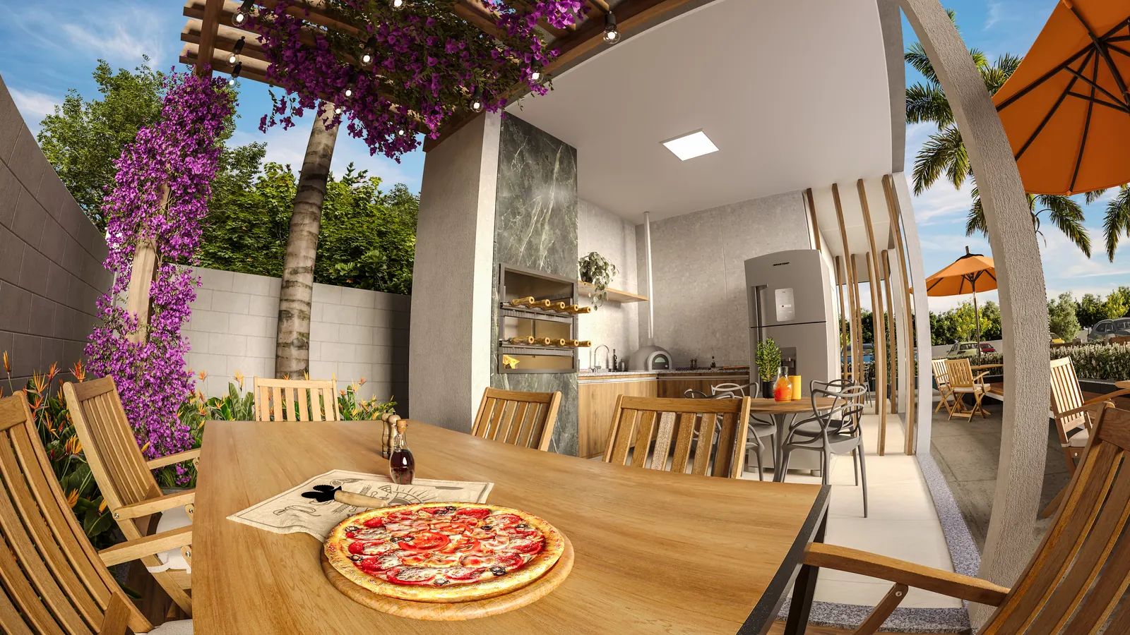 Espaço Toscana do Reserva das Aroeiras com mesa de madeira, churrasqueira, forno de pizza e geladeira sob pergolado